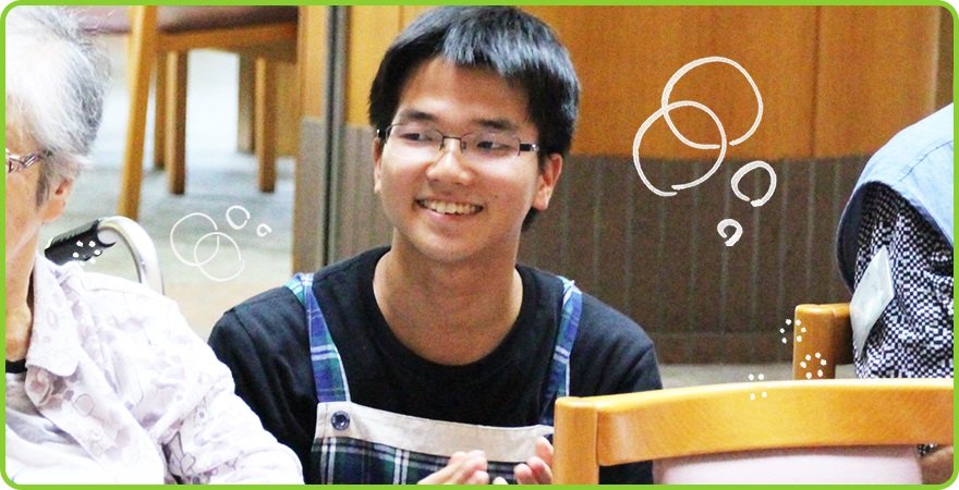 笑顔の髙橋さんの写真