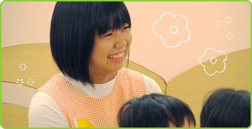 笑顔の志賀さんの写真